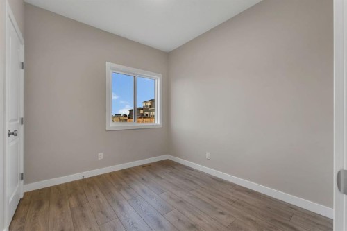 24 Corner Glen Green Ne, Calgary, AB - Indoor Photo Showing Other Room