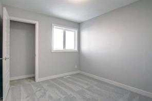 109 Cobblestone Gate Sw, Airdrie, AB - Indoor Photo Showing Other Room