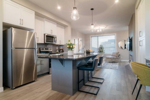 237 Cobblestone Gate Sw, Airdrie, AB - Indoor Photo Showing Kitchen With Stainless Steel Kitchen With Upgraded Kitchen