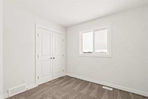 239 Creekstone Circle Sw, Calgary, AB - Indoor Photo Showing Other Room
