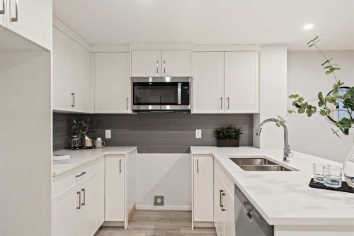 239 Creekstone Circle Sw, Calgary, AB - Indoor Photo Showing Kitchen With Double Sink