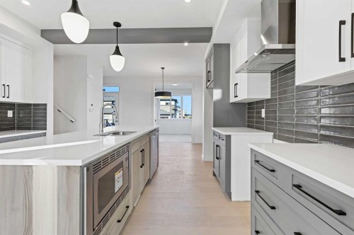 220 Waterford Heath, Chestermere, AB - Indoor Photo Showing Kitchen With Upgraded Kitchen