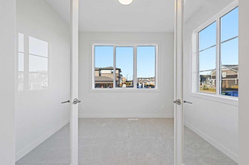 220 Waterford Heath, Chestermere, AB - Indoor Photo Showing Other Room