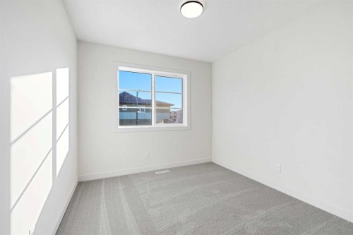 220 Waterford Heath, Chestermere, AB - Indoor Photo Showing Other Room