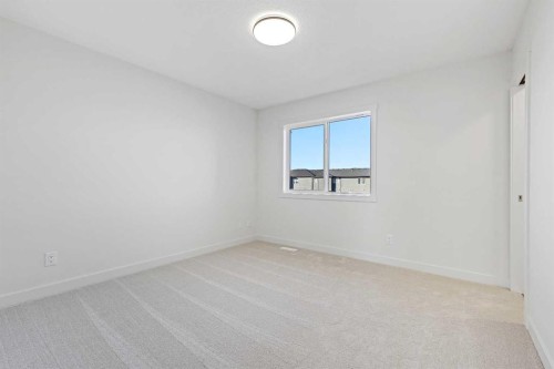 220 Waterford Heath, Chestermere, AB - Indoor Photo Showing Other Room