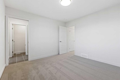 220 Waterford Heath, Chestermere, AB - Indoor Photo Showing Other Room