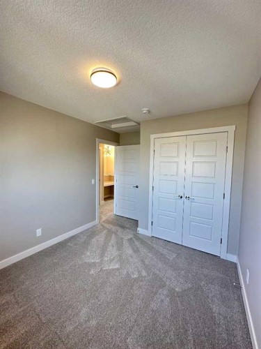 344 Waterford Boulevard, Chestermere, AB - Indoor Photo Showing Other Room