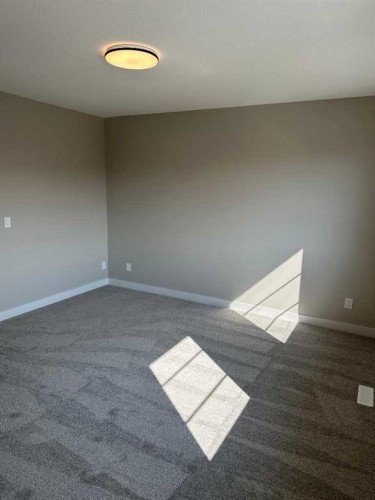 344 Waterford Boulevard, Chestermere, AB - Indoor Photo Showing Other Room
