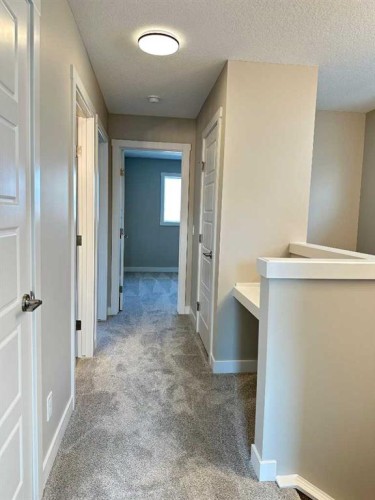 344 Waterford Boulevard, Chestermere, AB - Indoor Photo Showing Other Room