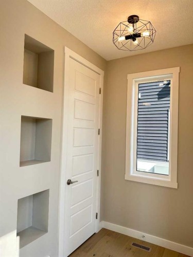 344 Waterford Boulevard, Chestermere, AB - Indoor Photo Showing Other Room