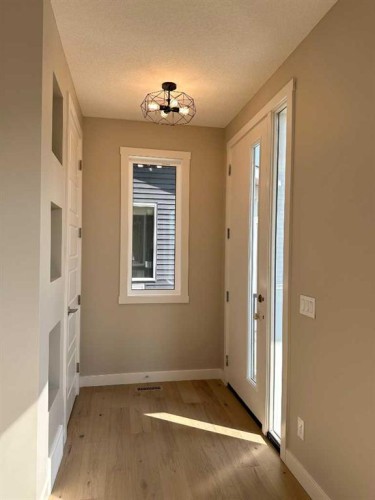 344 Waterford Boulevard, Chestermere, AB - Indoor Photo Showing Other Room