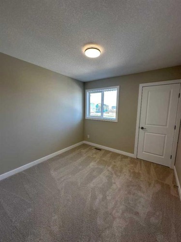 356 Waterford Boulevard, Chestermere, AB - Indoor Photo Showing Other Room
