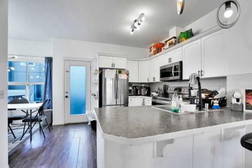 353-111 Tarawood Lane Ne, Calgary, AB - Indoor Photo Showing Kitchen With Double Sink