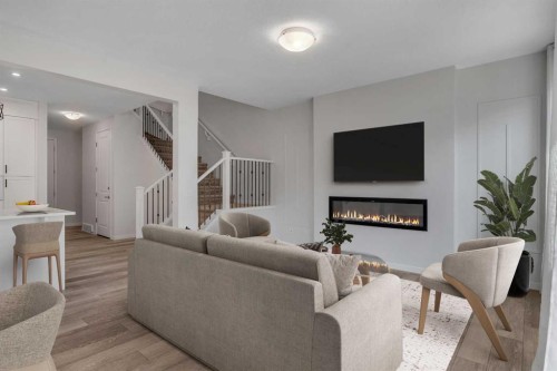 20 Rowley Common Nw, Calgary, AB - Indoor Photo Showing Living Room With Fireplace
