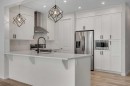 20 Rowley Common Nw, Calgary, AB  - Indoor Photo Showing Kitchen With Upgraded Kitchen 