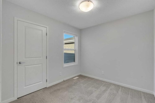 20 Rowley Common Nw, Calgary, AB - Indoor Photo Showing Other Room