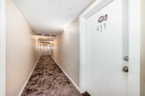411-2000 Applevillage Court Se, Calgary, AB - Indoor Photo Showing Other Room