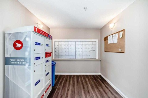 411-2000 Applevillage Court Se, Calgary, AB - Indoor Photo Showing Other Room