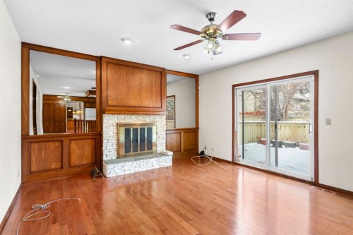 40 Edforth Road Nw, Calgary, AB - Indoor With Fireplace