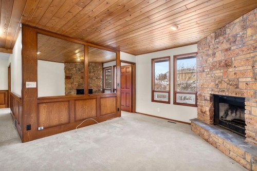 40 Edforth Road Nw, Calgary, AB - Indoor With Fireplace