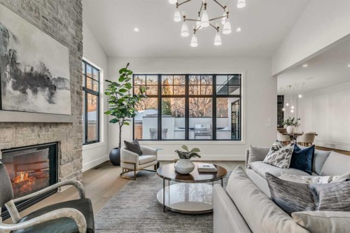 518 33 Avenue Sw, Calgary, AB - Indoor Photo Showing Living Room With Fireplace
