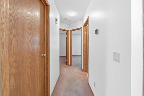 12 Arbour Cliff Close Nw, Calgary, AB - Indoor Photo Showing Other Room