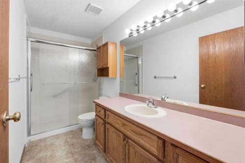 12 Arbour Cliff Close Nw, Calgary, AB - Indoor Photo Showing Bathroom