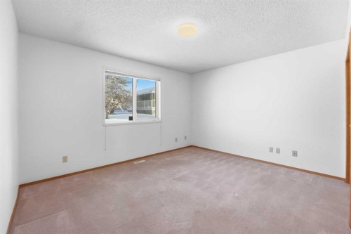 12 Arbour Cliff Close Nw, Calgary, AB - Indoor Photo Showing Other Room