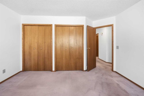 12 Arbour Cliff Close Nw, Calgary, AB - Indoor Photo Showing Other Room