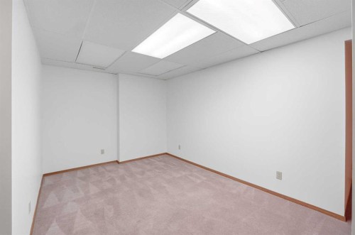 12 Arbour Cliff Close Nw, Calgary, AB - Indoor Photo Showing Other Room