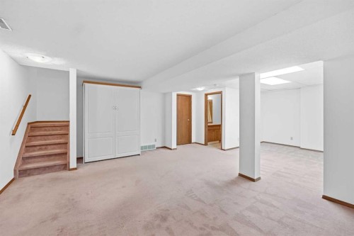12 Arbour Cliff Close Nw, Calgary, AB - Indoor Photo Showing Other Room