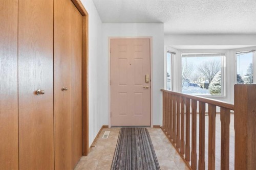 12 Arbour Cliff Close Nw, Calgary, AB - Indoor Photo Showing Other Room