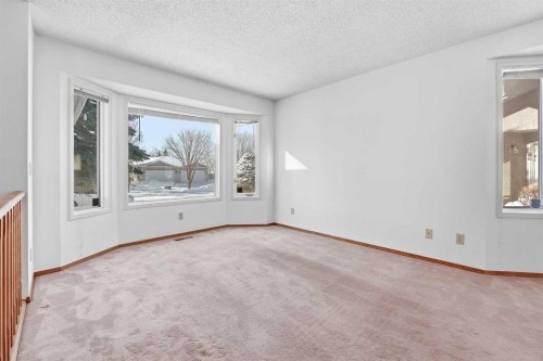 12 Arbour Cliff Close Nw, Calgary, AB - Indoor Photo Showing Other Room
