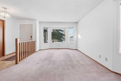 12 Arbour Cliff Close Nw, Calgary, AB - Indoor Photo Showing Other Room