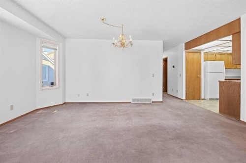 12 Arbour Cliff Close Nw, Calgary, AB - Indoor Photo Showing Other Room
