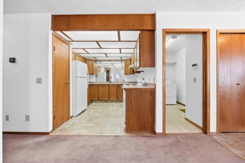 12 Arbour Cliff Close Nw, Calgary, AB - Indoor Photo Showing Other Room