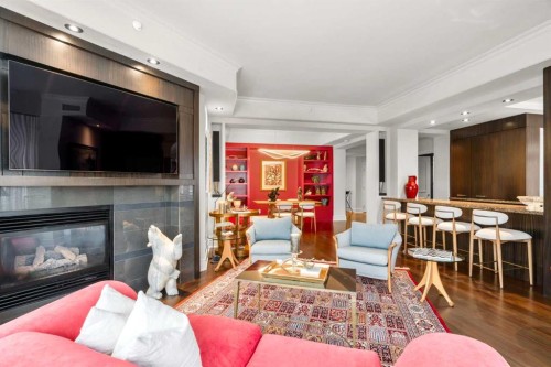 804-690 Princeton Way Sw, Calgary, AB - Indoor Photo Showing Living Room With Fireplace