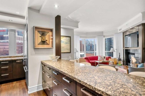 804-690 Princeton Way Sw, Calgary, AB - Indoor With Fireplace