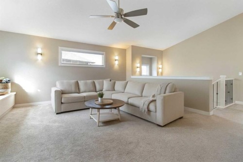 33 Silverado Crest Bay Sw, Calgary, AB - Indoor Photo Showing Living Room