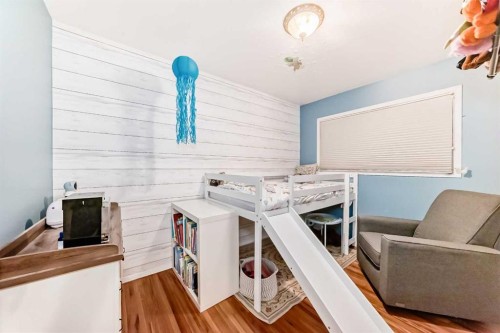 107 Fawn Crescent Se, Calgary, AB - Indoor With Fireplace