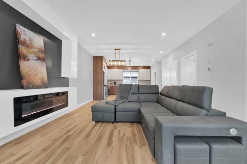 216 99 Avenue Se, Calgary, AB - Indoor Photo Showing Living Room With Fireplace