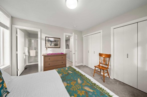 512 Drake Landing Wynd, Okotoks, AB - Indoor Photo Showing Bedroom