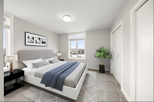 512 Drake Landing Wynd, Okotoks, AB - Indoor Photo Showing Bedroom