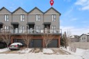 512 Drake Landing Wynd, Okotoks, AB  - Outdoor With Balcony With Facade 
