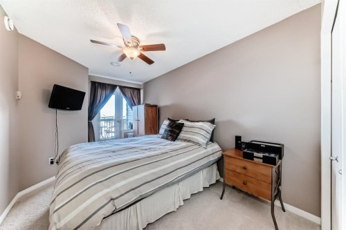 10-21 Mckenzie Towne Gate Se, Calgary, AB - Indoor Photo Showing Bedroom