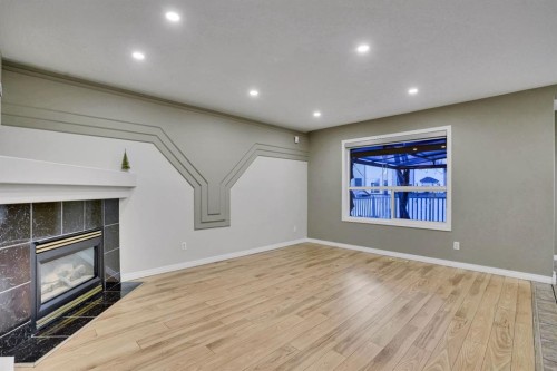 58 Lakeview Bay, Chestermere, AB - Indoor With Fireplace