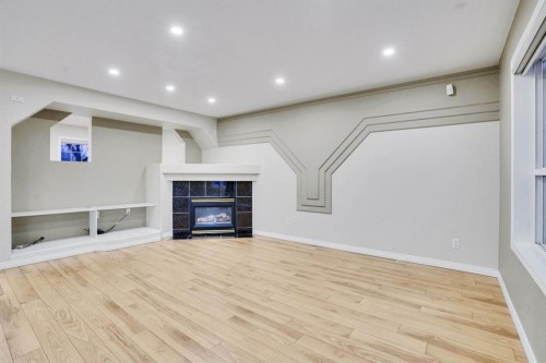58 Lakeview Bay, Chestermere, AB - Indoor With Fireplace