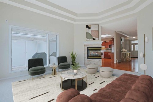 108 Hamptons Heights Nw, Calgary, AB - Indoor Photo Showing Living Room With Fireplace
