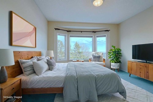 108 Hamptons Heights Nw, Calgary, AB - Indoor Photo Showing Bedroom