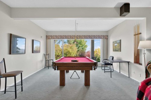 108 Hamptons Heights Nw, Calgary, AB - Indoor Photo Showing Other Room